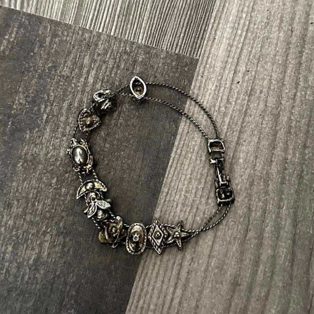 No brand silver moving charm bracelet